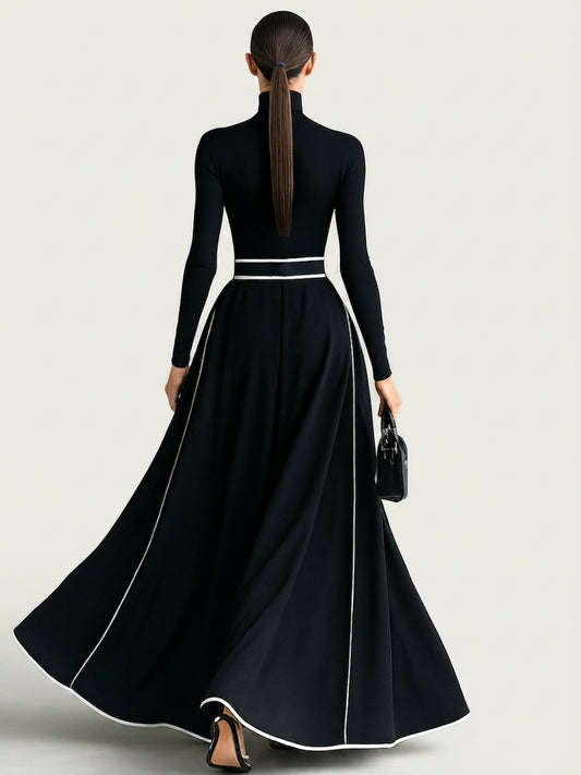 San Sebastian | Vestido Maxi Negro con Costuras Blancas y Cuello Alto