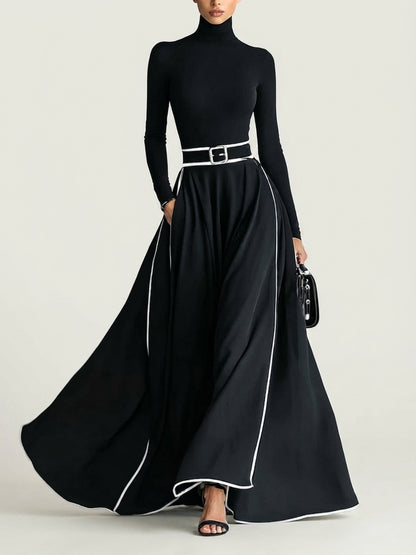 San Sebastian | Vestido Maxi Negro con Costuras Blancas y Cuello Alto