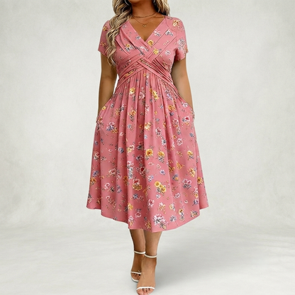Santander | Vestido floral con escote en V y detalle de torsión en la cintura elegante.