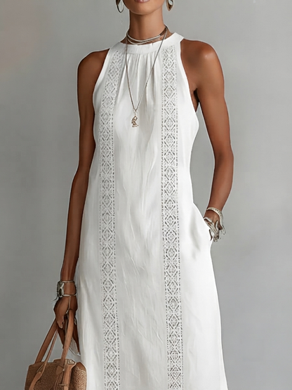 Alessandra | Vestido midi sin mangas blanco con detalles bordados y bolsillos laterales