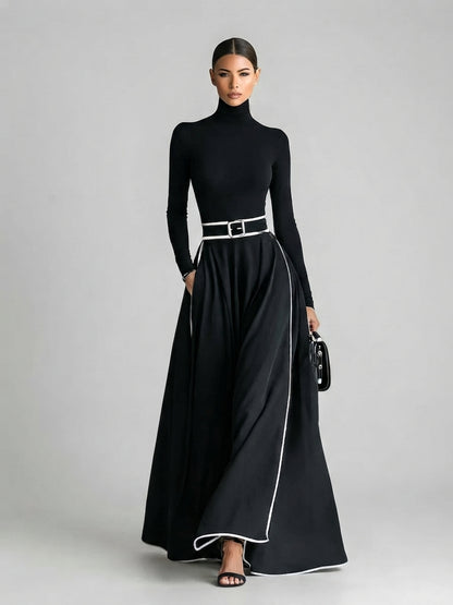 San Sebastian | Vestido Maxi Negro con Costuras Blancas y Cuello Alto
