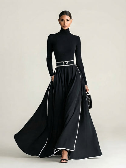 San Sebastian | Vestido Maxi Negro con Costuras Blancas y Cuello Alto
