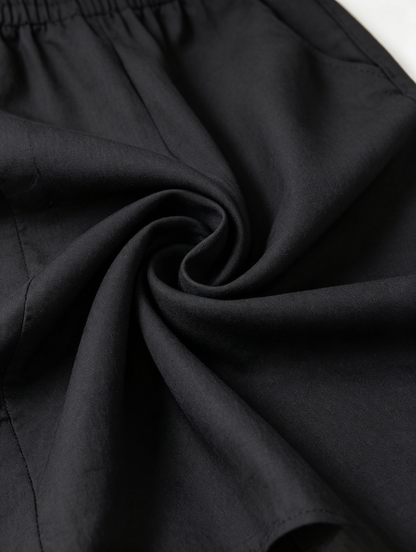 Marbella | Mono negro casual con hombros al aire y cordón ajustable