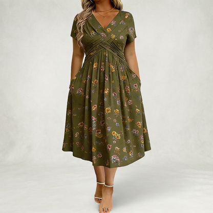 Santander | Vestido floral con escote en V y detalle de torsión en la cintura elegante.